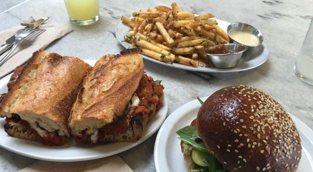 Sparkling ginger lemonade, chicken parm sandwich, fries, and the amazing burger at Gjusta